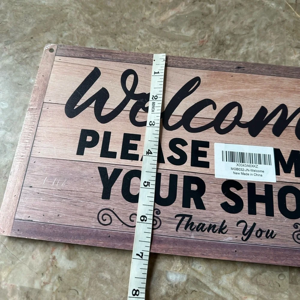 Welcome please remove your shoes thank you sign